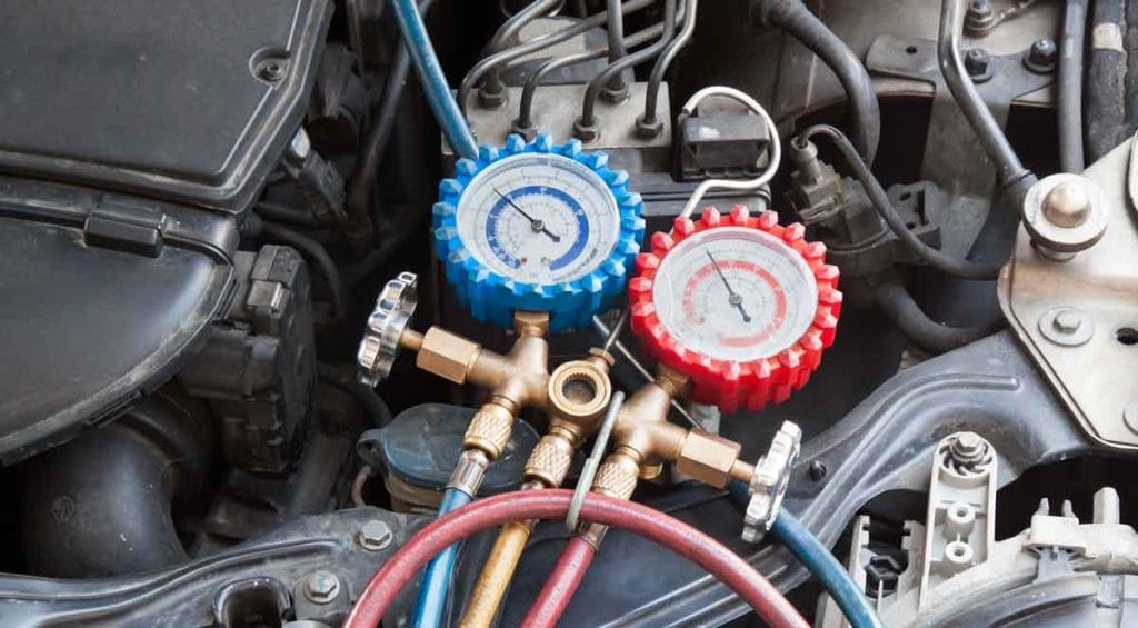 Gauges to recharge the gas on a car AC system
